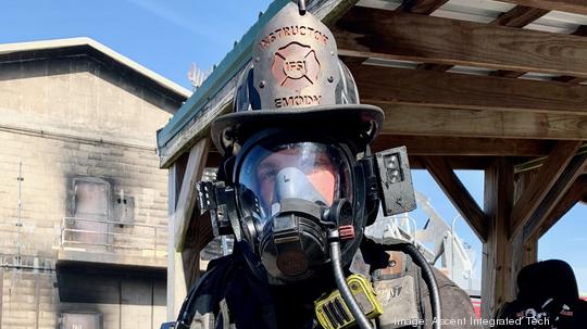 Alan Emody, an instructor at the Illinois Fire Service Institute in Champaign, Ill, wearing a respiratory mask outfitted with Ascent Integrated Tech