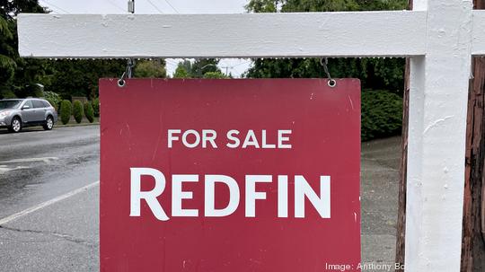 Redfin residential real estate "for sale" sign in Seattle