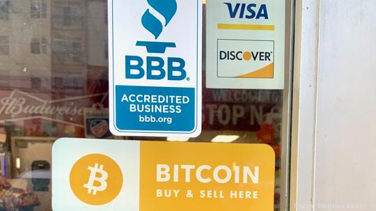 Bitcoin ATM sticker on Stop N Go window