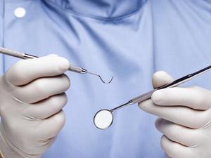 Dentist doing dental examination