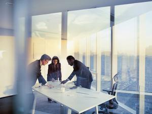 Business colleagues planning together in meeting