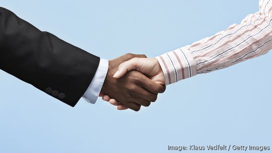 Business people shaking hands