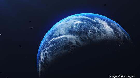 Close-Up Of Earth Against Blue Sky At Night