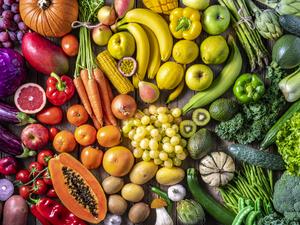 Colorful vegetables and fruits vegan food in rainbow colors