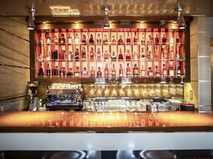 A bar with drinks display in a prestigious restaurant