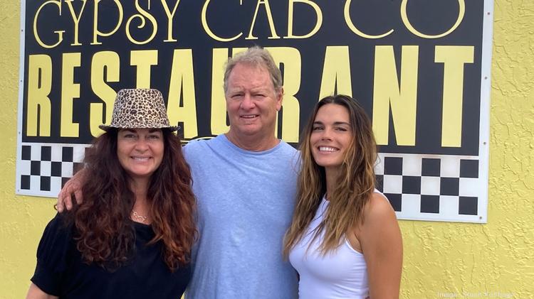 Gypsy Cab Co. owner Frank O'Rourke with Kendra Turley, left, and Chandelle McDonie. Turley is a partner in the restaurant, and McDonie is an artist who helped Gypsy Cab Co.'s renovations.