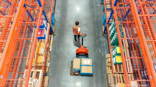 High angle view of Male warehouse worker.