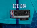 PHOTOS: Hornets anticipate strong merchandise sales for new special-edition  uniform - Charlotte Business Journal