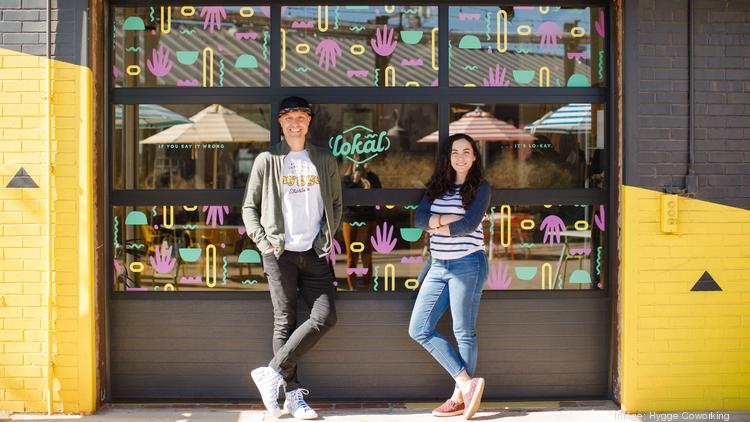 Garrett Tichy and Alyssa Pressler stand in front of their retail concept, Lokal, which has a grand opening set for Nov. 27 in Camp North End.