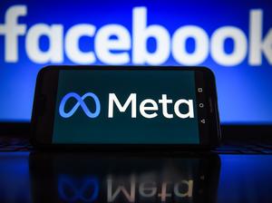 In this photo illustration a Meta logo seen displayed on a