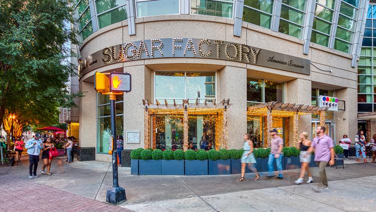 A Florida-based company has purchased a Midtown retail center on Peachtree Street Northeast for a record price.