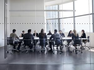 Colleagues at business meeting in conference room