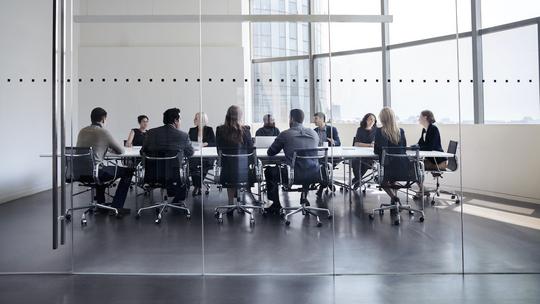 Colleagues at business meeting in conference room