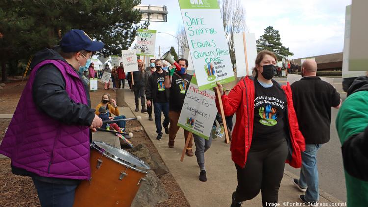 As hundreds of nurses picket, Providence St. Vincent CEO Jennifer ...