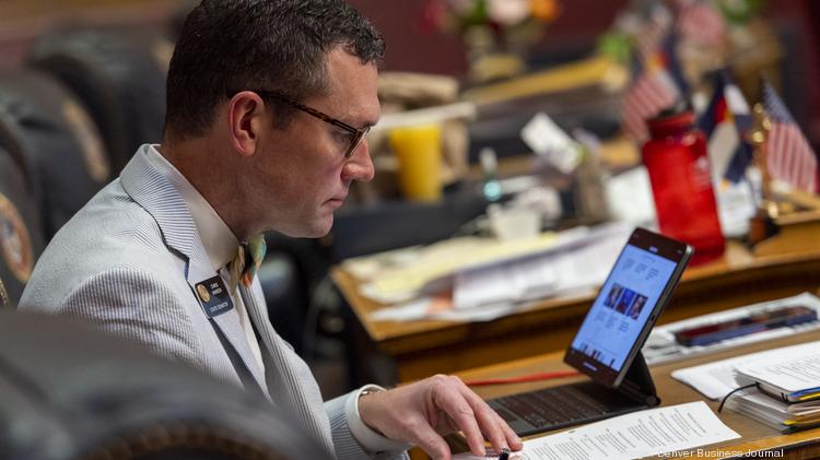 Colorado state Sen. Chris Hansen, D-Denver, works at his desk on the penultimate day of the 2022 legislative session.