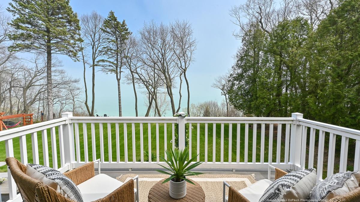 Inside 3.59M Fox Point lakeside home with elevator, EV charging Open