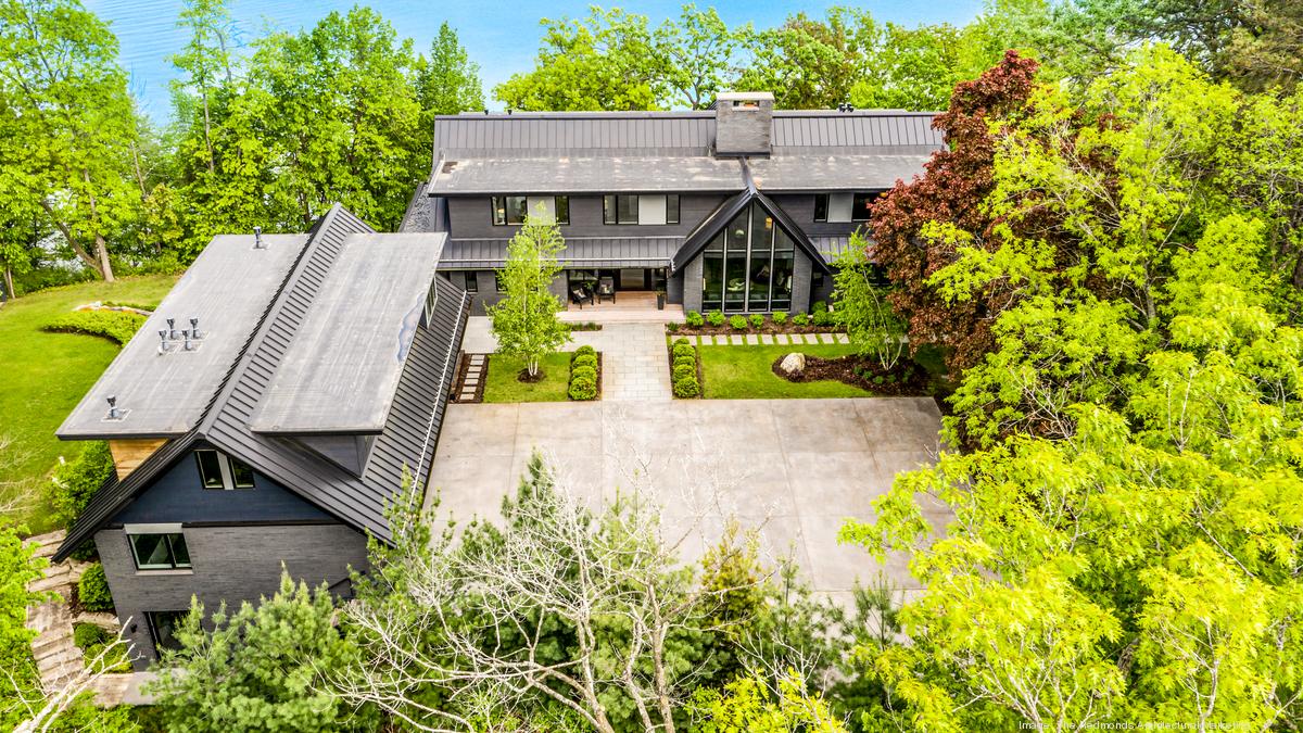 See 7.5M Hartland home on Beaver Lake with bar, bowling and bunk rooms