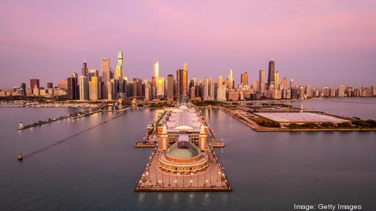 Aerial view of Navy Pier and cityscape at sunrise, Chicago, Illinois, USA