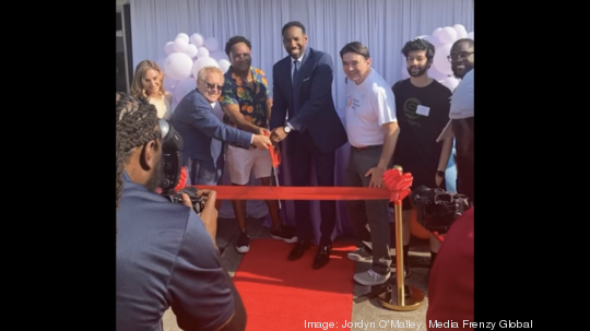 Mayor Andre Dickens and Marlon Williams cut the ribbon at the Atlanta Blockchain Center's grand opening.