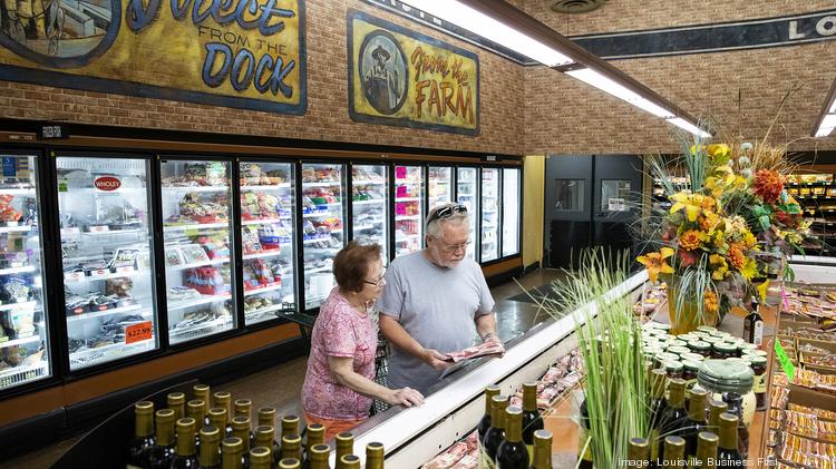 Customers shop in the meat department at the Outer Loop Plaza ValuMarket location in South Louisville.