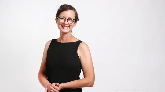 2022 Puget Sound Business Journal (PSBJ) 40-Under-40 honoree Laura Malcolm is pictured in the newsroom photo studio in Seattle