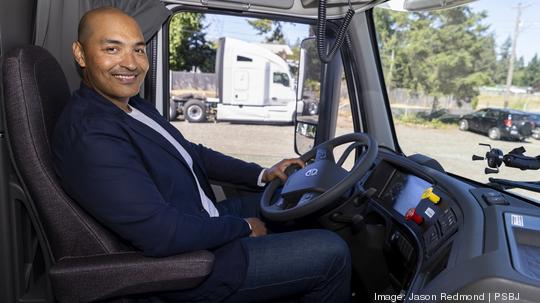 Damien Hutchins, CEO and co-founder of Rollzi is pictured at his company’s facility in Tacoma