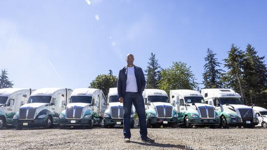 Damien Hutchins, CEO and co-founder of Rollzi is pictured at his company’s facility in Tacoma