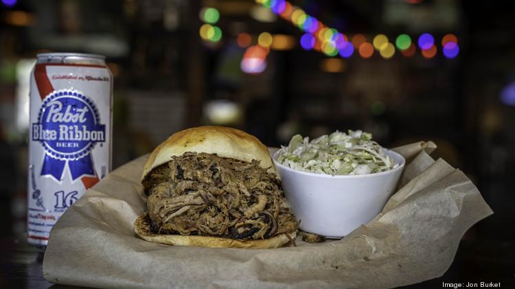 The menu at Brother Jimmy's barbecue restaurant includes pulled pork sandwiches.