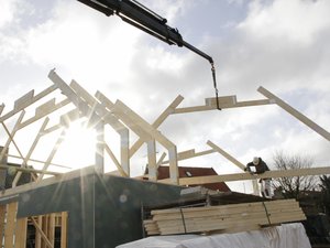 Builder at work on new structure new home construction