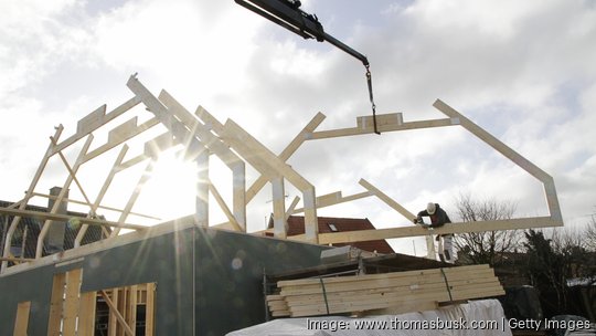 Builder at work on new structure new home construction