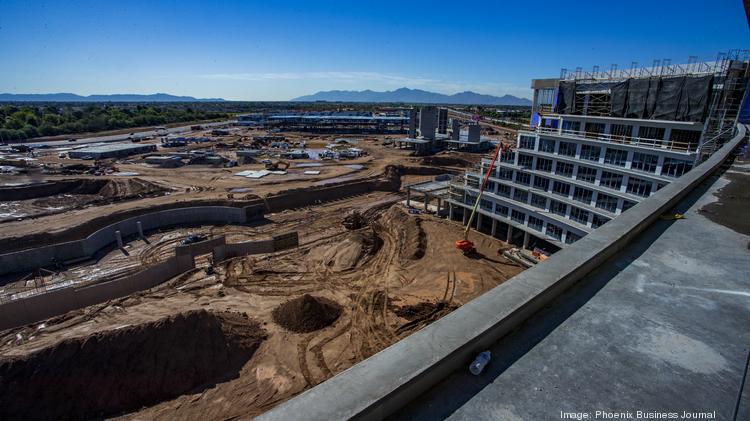 Construction progresses at the 60-acre Glendale resort, which will include the soon-to-be largest hotel in Arizona with 1,200 rooms, a 360-degree concert stage, a dozen restaurants and a 6-acre lagoon.