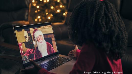 Little Girl Talking to Santa Claus on a Video Call