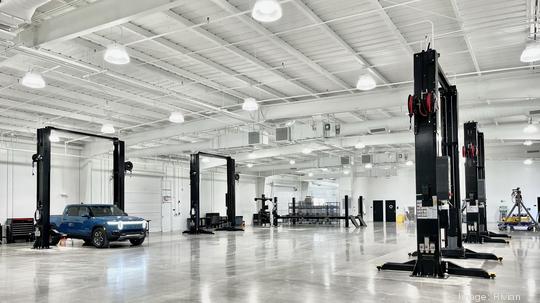 Service bay inside of Rivian's Sacramento Service Center