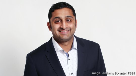 PSBJ 2023 40-Under-40 honoree Prem Kumar is pictured in the newsroom photo studio in Seattle,