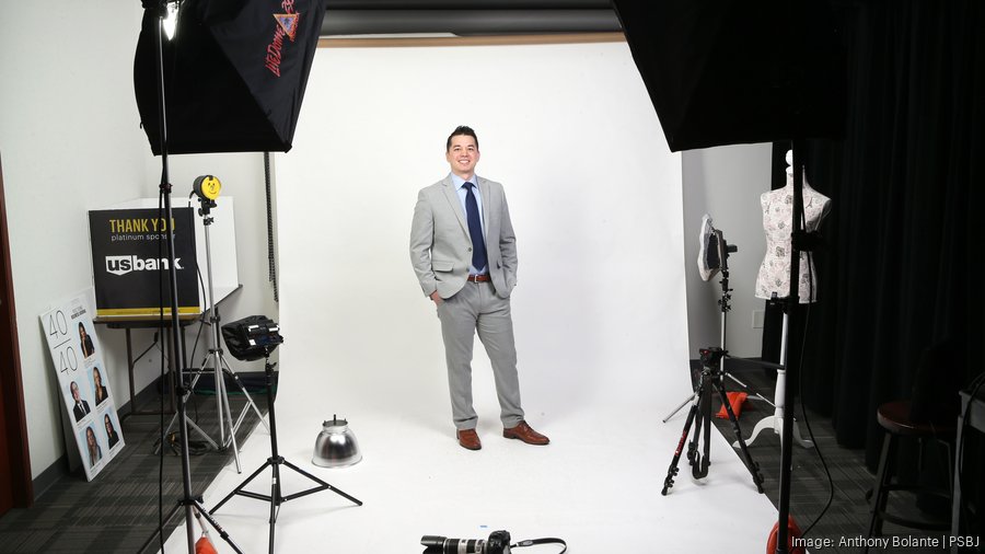 PSBJ 2023 40-Under-40 honoree Daniel Hanson is pictured in the newsroom photo studio in Seattle