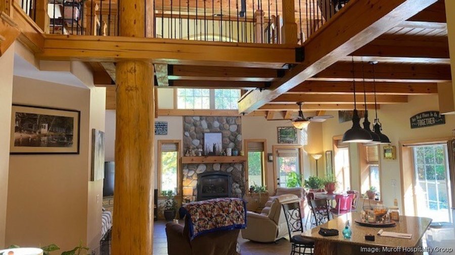 HideAWay Waterfront Cottages in Lake Luzerne acquired by real estate agent Mary Diehl Gibson