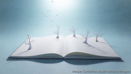 Pop-up book withpaper forest and flock of birds