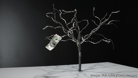 single dollar note on wire tree