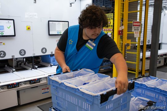 walmart associate with crates