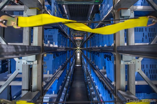 blue bins in warehouse aisle