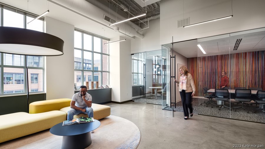 redesigns, consolidates Arena District office Columbus Business