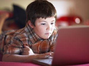 Child using laptop