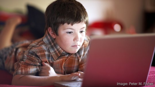 Child using laptop