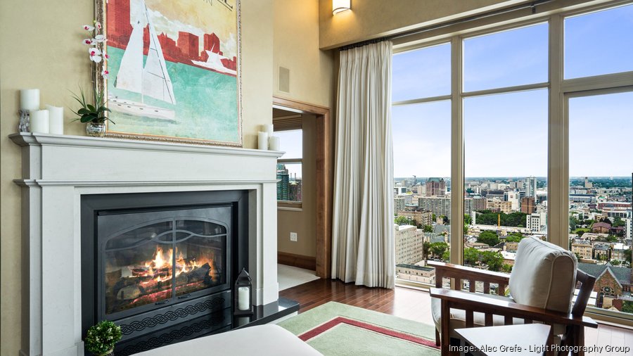 Image showcasing Two-story downtown Milwaukee penthouse condo back on market for $1.47M ...