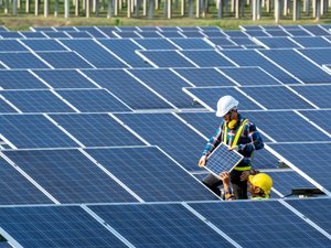 Electrician installing solar panels