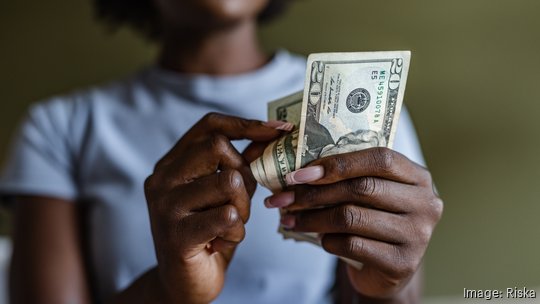 Close up of a woman counting money