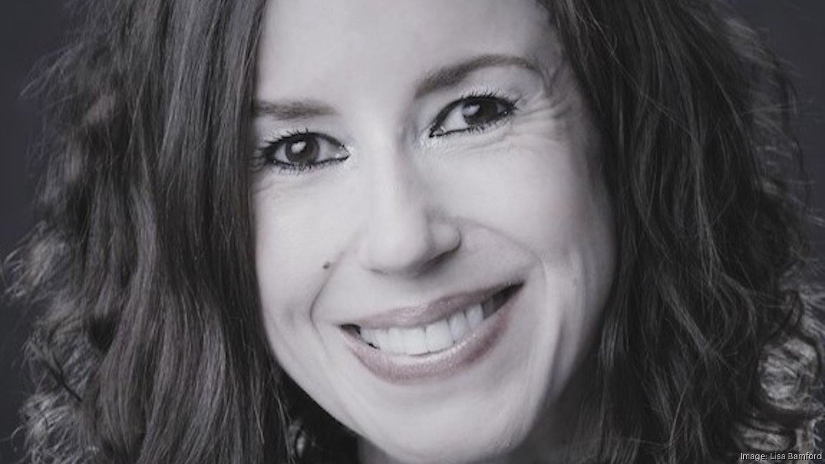 2023 Leaders in Diversity Awards Lisa Bamford with Sciencix Triangle