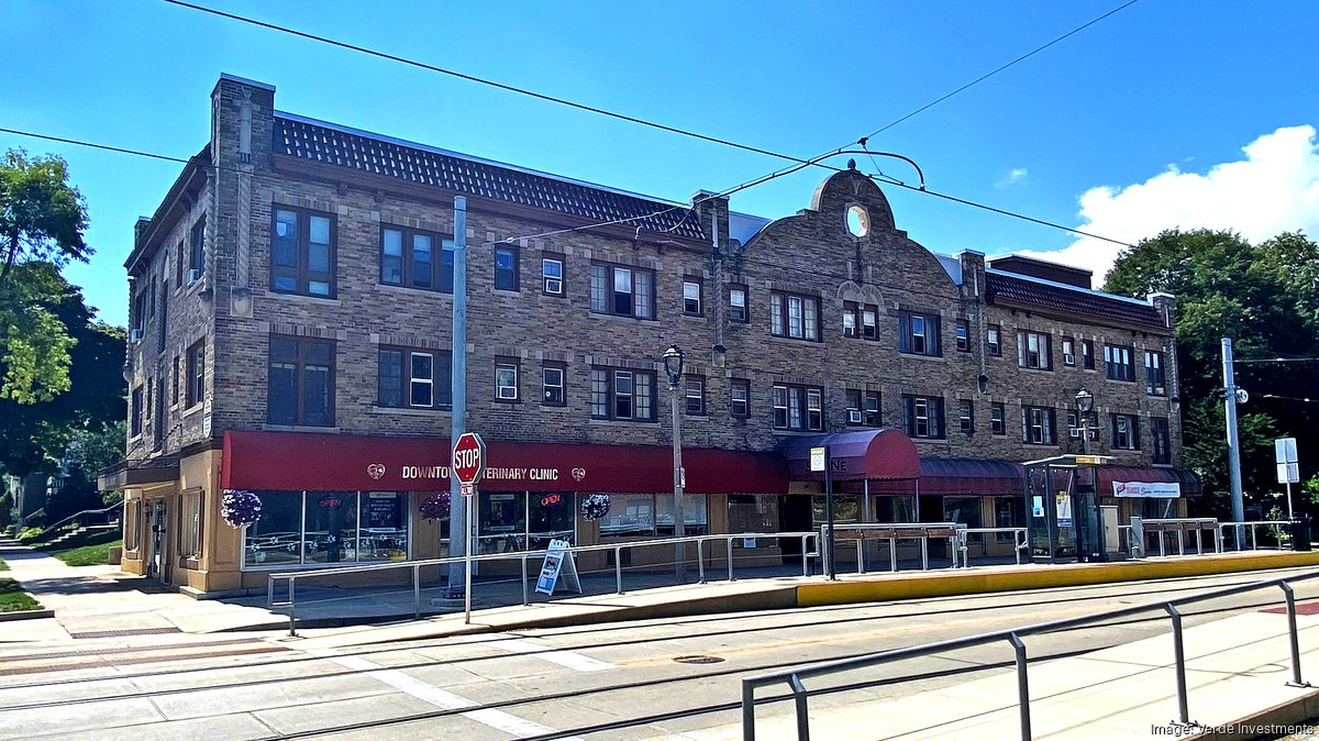 Lower east side apartment building along The Hop tracks sold
