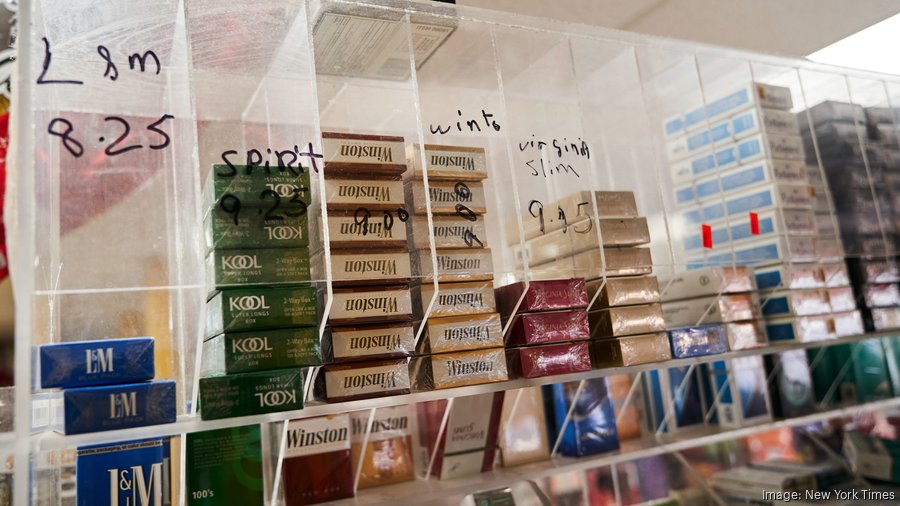 Council overturns Sam Page veto on tobacco sales near schools