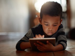 child using a smart device